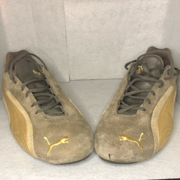 gold puma shoes